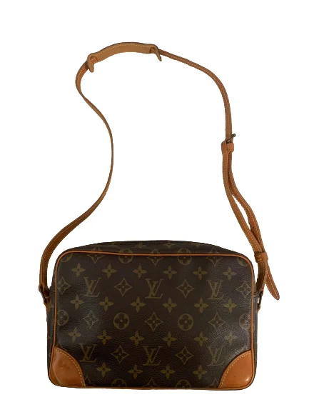 Louis Vuitton crossbody bags with a printed floral pattern for femininityLouis Vuitton Trocadero 27 i Monogram