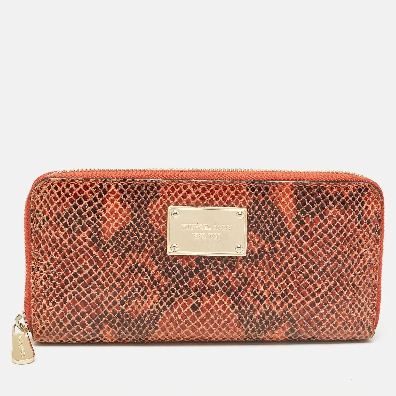 Michael Michael Kors Bags for shopping sprees in the cityOrange/Brown Snakeskin Embossed Leather Jet Set Zip Around Wallet